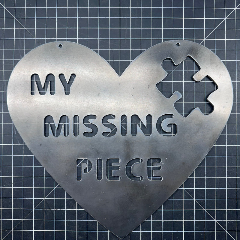 Missing Piece Heart metal wall art, steel puzzle-piece heart decor