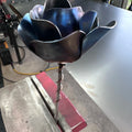 Metal rose close-up showing hand-finished petal detail