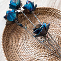 Steel rose displayed as home decor accent piece