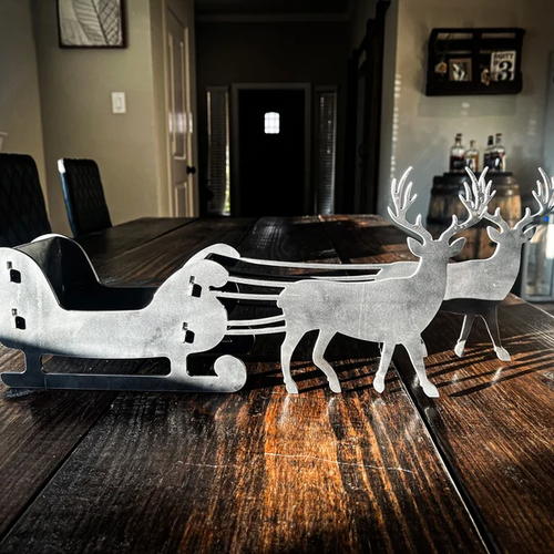 Metal Christmas sleigh and reindeer silhouette, steel holiday decor